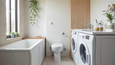 Łazienka z wanną pralką i suszarka